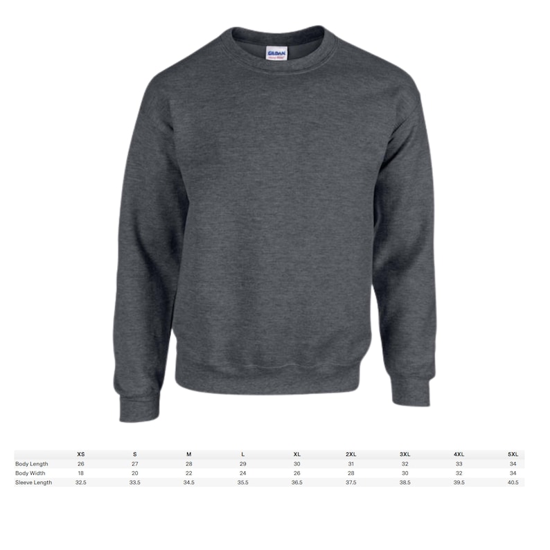 May include: A dark heather gray crewneck sweatshirt. The image shows the front of the sweatshirt, with a ribbed collar, cuffs, and hem. Size chart with body length, width, and sleeve length measurements in inches is below the sweatshirt.