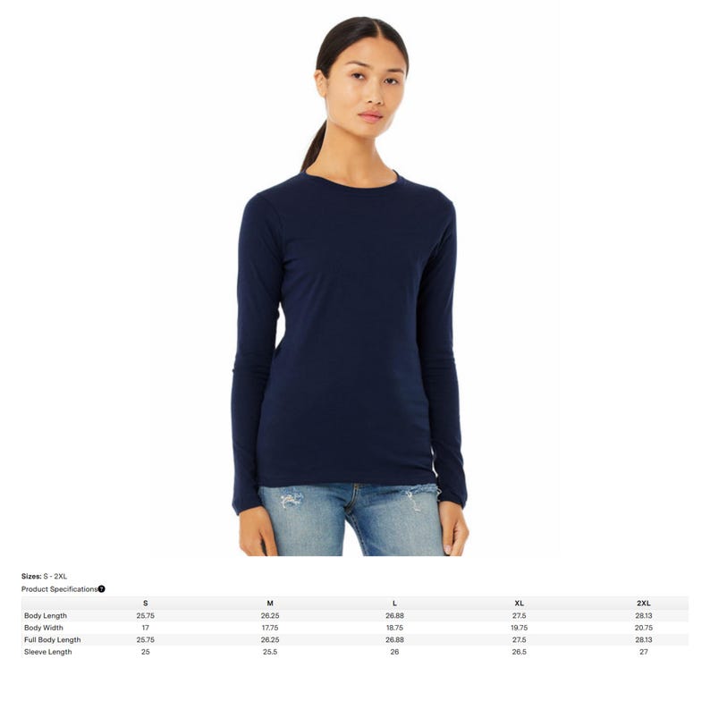 May include: A navy blue long-sleeve shirt. The shirt is a solid color and has a crew neck. The image also includes a size chart with measurements in inches for sizes S-2XL.