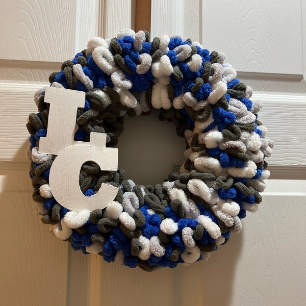 3 color looped yarn wreath in royal blue,silvergray and white. For those in the tri-town area in NW Indiana- Go LC!!! Lake Central Indians!!