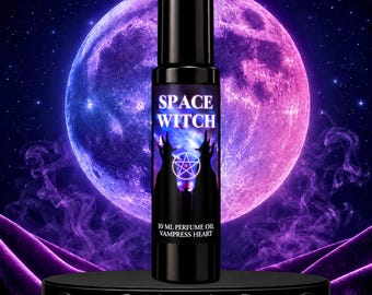 May include: A black rollerball perfume bottle with a label featuring the text SPACE WITCH, a pentagram symbol, and the text 10 ML PERFUME OIL VAMPRESS HEART. The bottle has a black cap and is positioned vertically against a purple moon background.