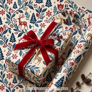 May include: A rectangular gift box wrapped in cream-coloured paper featuring a repeating pattern of red and blue deer, pine trees, snowflakes, and floral sprigs. The box is tied with a wide red velvet ribbon and topped with a small gold star.