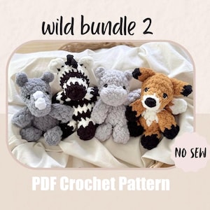 May include: A collection of four handmade crochet animal toys: a gray rhino, a black and white zebra, a gray hippo, and a brown and white fox. The text "wild bundle 2" and "PDF Crochet Pattern" are visible.