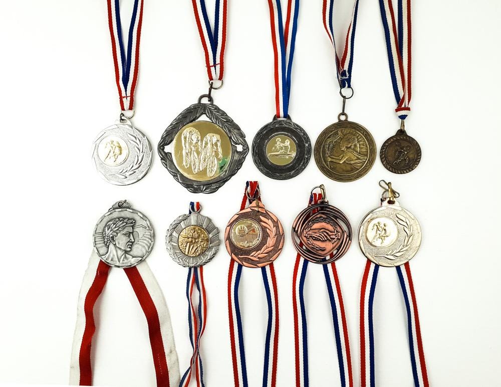 Médaille sportive vintage en or, rare (Gebraucht) in La Tour-de-Trème