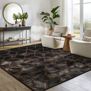 May include: A dark brown and gray geometric patterned rug with a subtle sheen. The rug is laid out in a living room with two white armchairs and a wooden side table.
