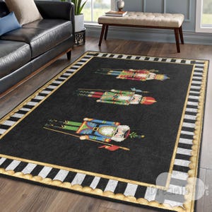 May include: Black rectangular area rug featuring three colorful nutcracker soldier illustrations. The rug has a gold border with a black and white striped inner border. The nutcrackers are in red, green, and blue uniforms.