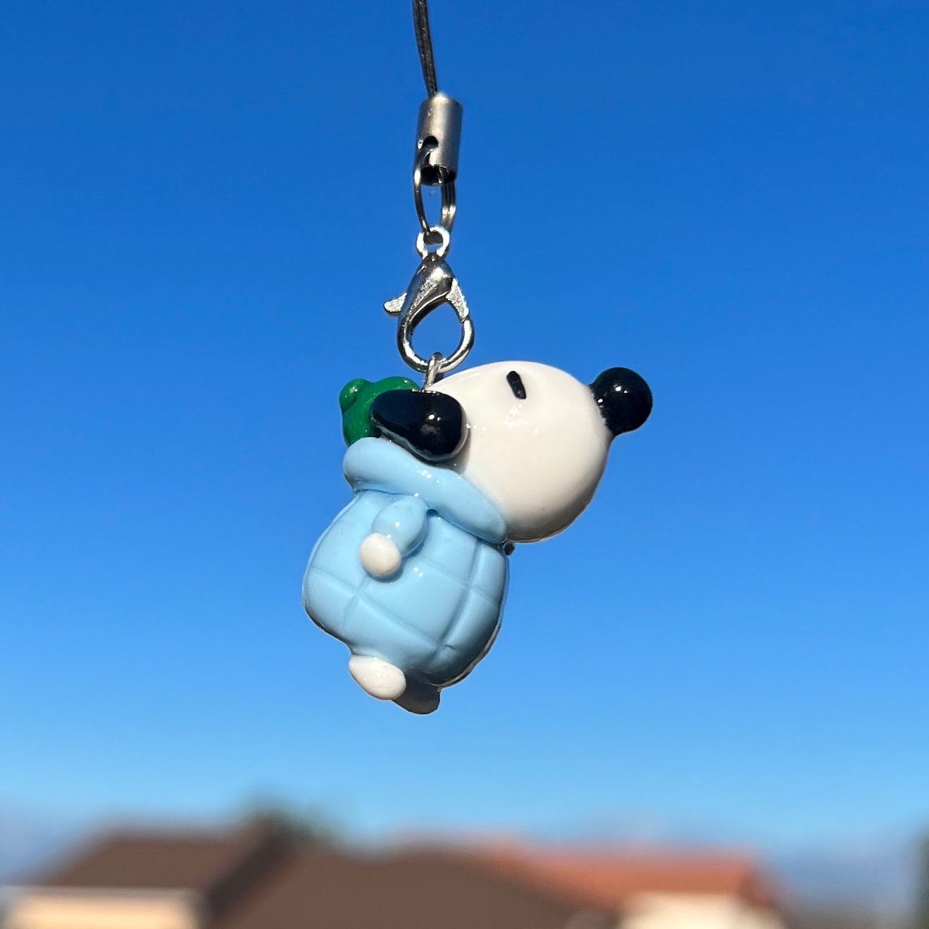 Snoopy in a puffer coat keychain