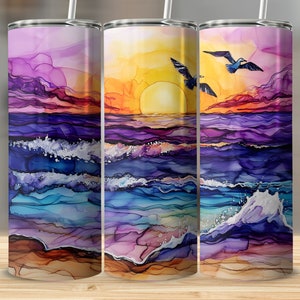 May include: Three stainless steel tumblers with a colorful sunset and ocean scene. The scene features a yellow sun, purple and blue waves, and two birds flying over the water.