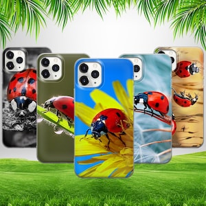 May include: Five different phone cases with ladybug designs. The cases are all black, green, blue, white, and brown. Each case features a different ladybug design with a red body and black spots.