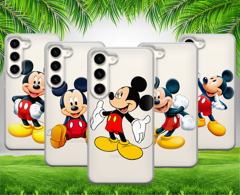 May include: Four white phone cases with different Mickey Mouse characters on them. The phone cases are all the same size and shape. The Mickey Mouse characters are all in different poses. The phone cases are all on a green grassy surface.