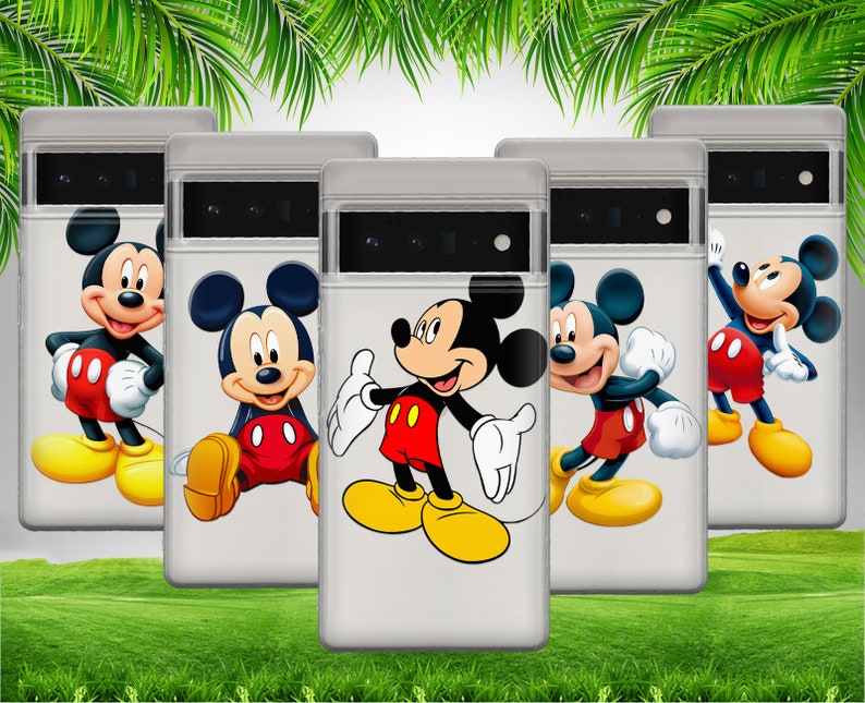 May include: Four clear phone cases with different Mickey Mouse designs. The cases are white with a black outline and a Mickey Mouse character in the center. The Mickey Mouse characters are all smiling and have different poses. The cases are all on a green grassy surface.