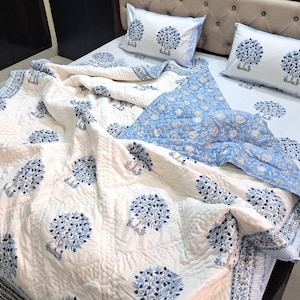 Parure de lit en coton bleu clair et blanc : édredon bleu blanc, drap plat avec couvre-oreillers