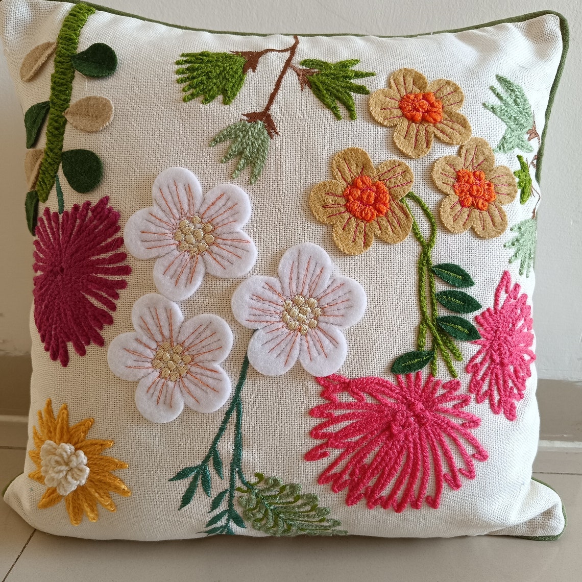 Handmade home accessories displayed in a cozy living room setting.