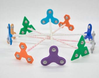 FidgetFlow: Een UV-actief jongleerspeeltje voor contactjongleren en fidgetspeelgoed voor jongleren. Een mini-flowstick/flow-speeltje.