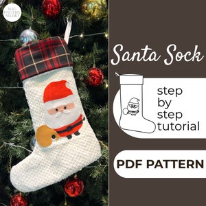 May include: A white Santa Claus stocking with a red and black plaid cuff. The stocking has a felt applique of Santa Claus holding a gift. The image includes the text "Santa Sock step by step tutorial PDF PATTERN".