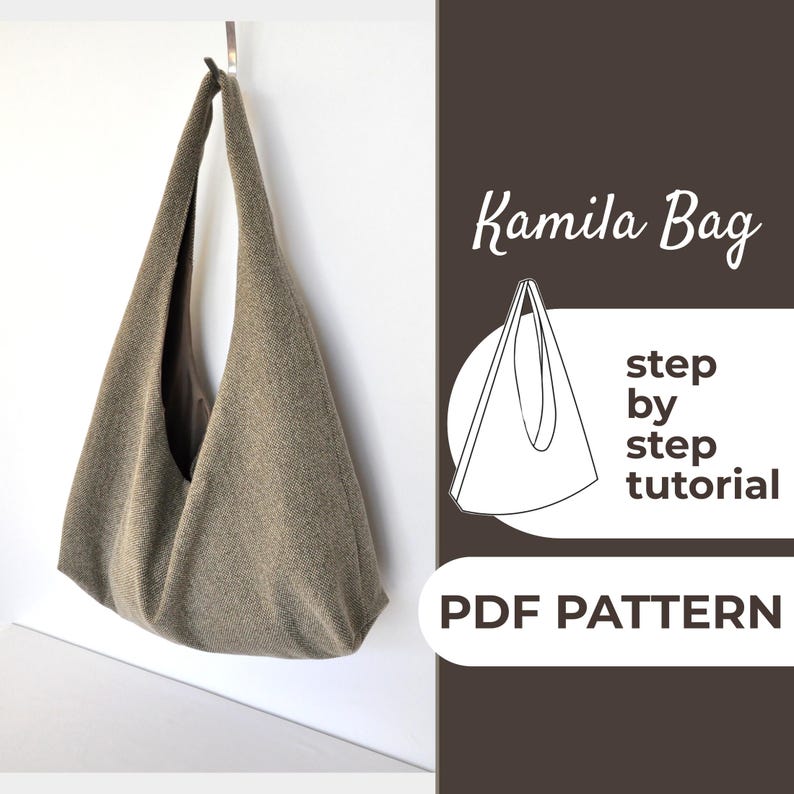 Pu&ograve; includere: Una borsa tote in tessuto marrone con un tutorial passo dopo passo per realizzare la borsa. Il testo "Kamila Bag" e "PDF PATTERN" &egrave; incluso anche nell'immagine.