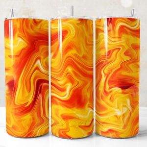 May include: Three stainless steel tumblers with a yellow and orange abstract swirl pattern.