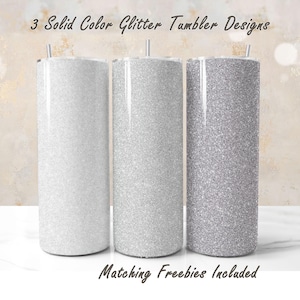 May include: Three silver glitter tumblers with matching straws. The tumblers are all the same size and shape, but they have different shades of silver glitter. The text "3 Solid Color Glitter Tumbler Designs" is at the top of the image, and the text "Matching Freebies Included" is at the bottom of the image.