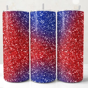 May include: Three stainless steel tumblers with a glittery red, blue, and purple gradient design. Each tumbler has a silver straw and a matching lid. The tumblers are cylindrical and appear to be insulated, suitable for hot or cold beverages.