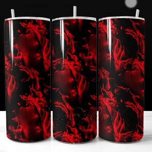 May include: Three stainless steel tumblers with a red and black abstract flame design.