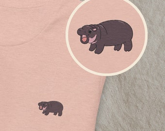 Embroidered T-shirt featuring a baby pygmy hippopotamus, a nature and river lover, the perfect gift for fans of Thailand’s baby hippo.
