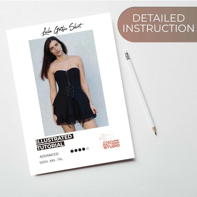 May include: An illustrated tutorial for a Leila Gothic Skirt. The image shows a woman wearing a black strapless dress with a lace trim. The tutorial is labeled "Advanced" and includes sizes XXS-7XL. A pencil rests on the white surface.