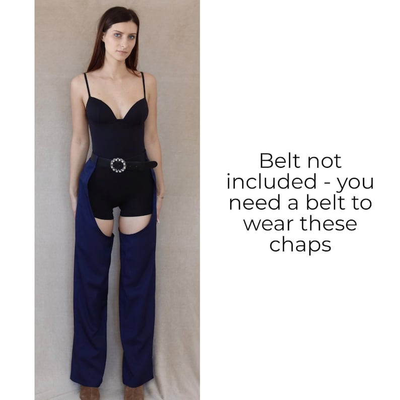 May include: A woman wearing a black bodysuit and shorts with blue chaps. The chaps have a cutout design and are worn with a belt. The text on the right says, "Belt not included - you need a belt to wear these chaps."