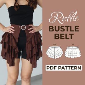 May include: A brown ruffle bustle belt featuring a circular silver buckle and layered fabric tiers. The image includes text reading Ruffle BUSTLE BELT and PDF PATTERN, alongside black and white line drawings showing the front and back views.