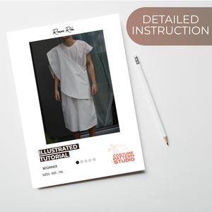May include: A white illustrated tutorial sheet with the text "Roman Robe" and "Illustrated Tutorial". The sheet includes a photo of a white Roman-style outfit. A white pencil is next to the sheet. The text "Detailed Instruction" is at the top.