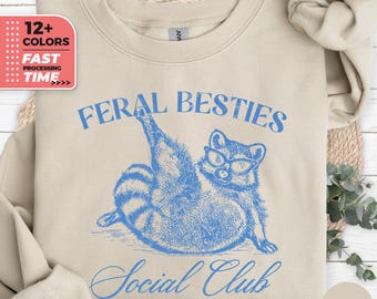 Feral Besties Social Club Sweatshirt – Funny Raccoon Cat Friendship Sweater