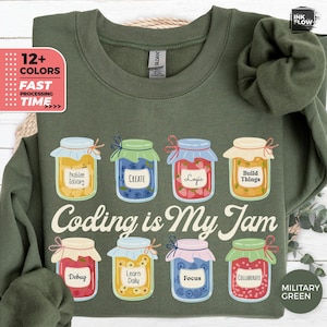 May include: Military green sweatshirt featuring the text "Coding is My Jam" and jam jar illustrations with coding terms such as "Debug" and "Logic". The sweatshirt also has text indicating multiple colour options and fast processing.
