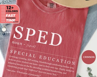 May include: A crimson red t-shirt with the word "SPED" in white text, defined as "SPECIAL EDUCATION". The definition describes a strategy-creating, IEP-writing, breakthrough-celebrating human who believes every student can learn in their own way.