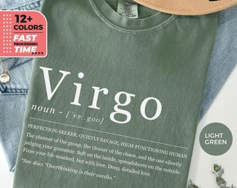 Może przedstawiać: Jasnozielona koszulka z napisem "Virgo" w białym kolorze. Tekst zawiera definicję "PERFECTION-SEEKER, QUIETLY SAVAGE..." oraz frazę "Overthinking is their cardio." Kapelusz i dżinsy są widoczne w tle.