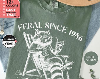 Personalized Feral Since Birth Year Comfort Colors Shirt – Funny Raccoon Birthday T-Shirt