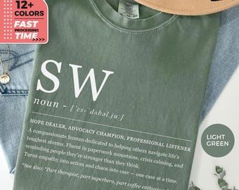 May include: Light green t-shirt with the letters "SW" in white, followed by a definition. The definition includes the words "Hope Dealer, Advocacy Champion, Professional Listener." The shirt also has a "12+ Colors" and "Fast Processing Time" graphic.