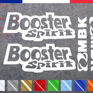 May include: Two white vinyl stickers with the text "Booster Spirit" and "MBK" in a stylized font. The stickers are on a gray background.
