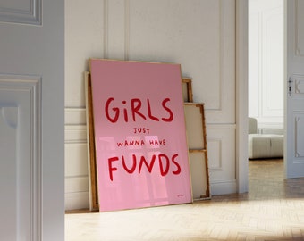 May include: A pink framed poster with the text "GIRLS JUST WANNA HAVE FUNDS" in red lettering.