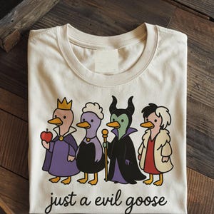 Evil Goose Unisex Softstyle TShirt - Fun Graphic Tee for Animal Lovers, Quirky Gift, Casual Wear, Halloween T-Shirt, Style, kawaii, magical