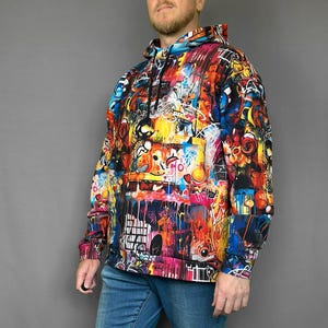 Graffiti Art Hoodie - Vibrant Urban Streetwear - Abstract and Cartoonish Graffiti for Everyday Wear