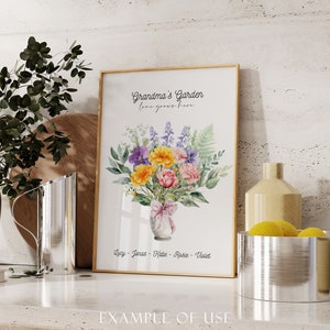 May include: A framed print with a watercolor illustration of a bouquet of flowers in a vase. The text "Grandma's Garden, love grows here" is at the top of the print. The names Lucy, Jonas, Katie, Rosie, and Violet are listed at the bottom.