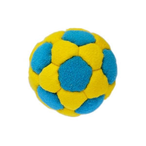 May include: A yellow and blue football made of soft fabric. The ball has a textured surface and is designed for play.