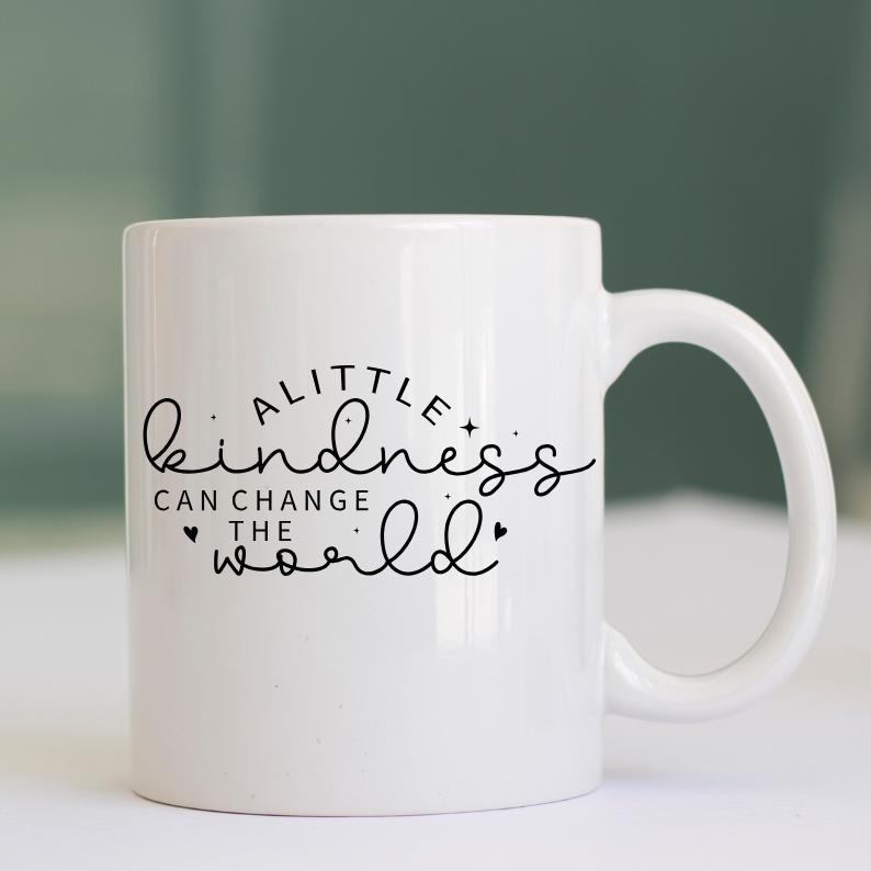 May include: White ceramic mug with a black inscription that reads "A little kindness can change the world".