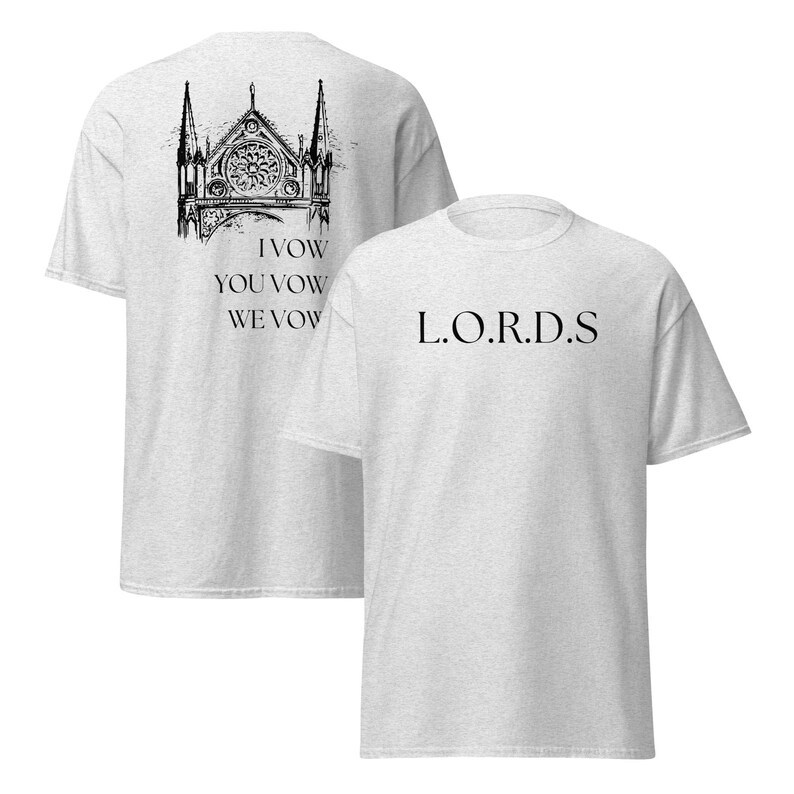 May include: Two grey t-shirts with black text. The front of one shirt features a drawing of a church with the text "I Vow You Vow We Vow". The back of the other shirt has the text "L.O.R.D.S."