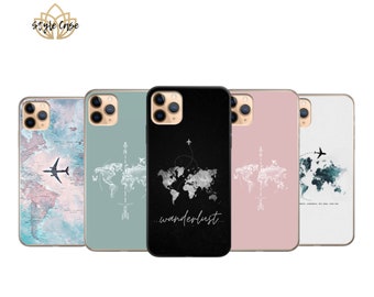 May include: A collection of five phone cases with travel-themed designs. The cases feature world maps, compasses, and airplanes in various colors, including blue, pink, and black. The text "wanderlust" is displayed on one case.