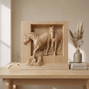 Wood carved horse couple relief wall art displayed on table in warm interior showing scale and decorative use.
