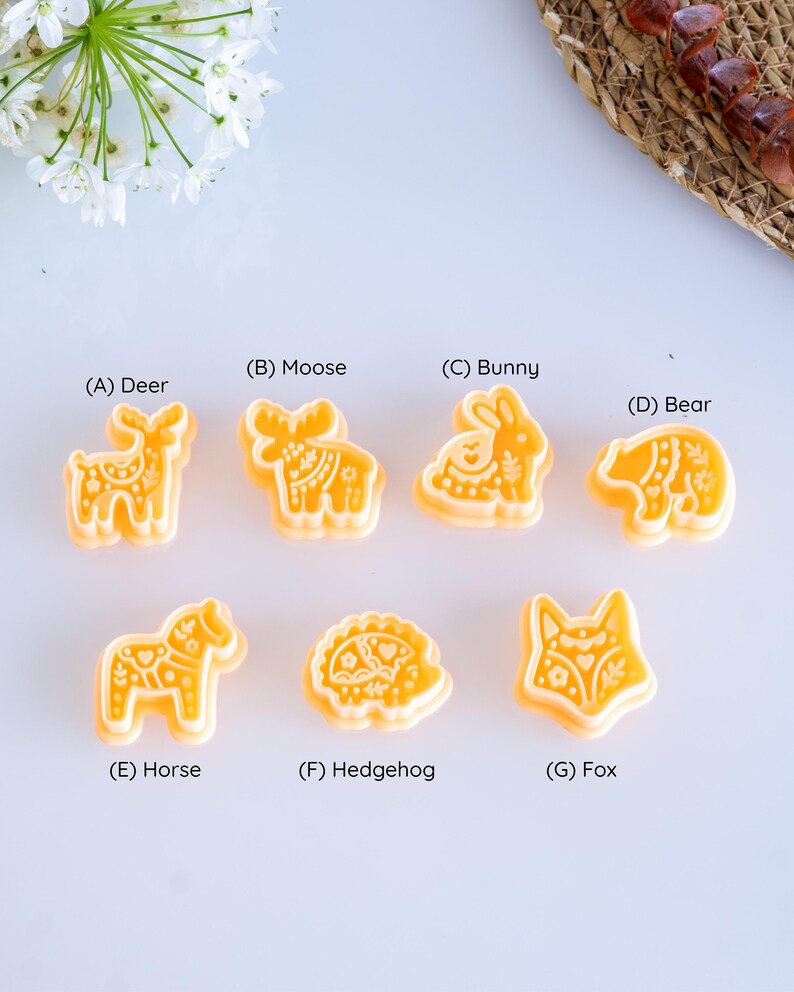 Full scandi folk animal clay cutter set with 7 labeled designs including deer, moose, bunny, bear, horse, hedgehog and fox