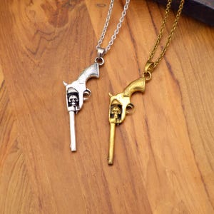 Vintage Revolver Pendant Necklace with Skull Detail – Steampunk, Biker, and Gothic Jewelry for Men & Women
