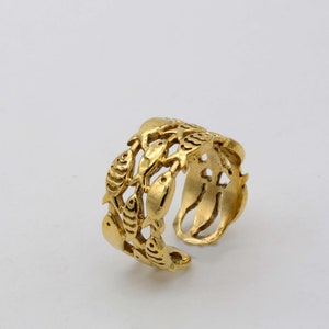 Adjustable fish ring featuring a swimming fish design, inspired by the sea and ocean, perfect for ocean lovers.