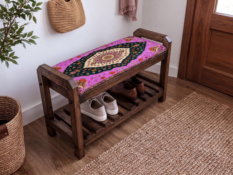 a wooden bench with a colorful, patterned seat cushion, placed in a room with a woven basket and a rug on the floor.