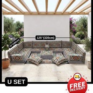May include: U-shaped outdoor seating set with patterned cushions and a central coffee table. The set measures 125 inches (320cm) wide and 70 inches (180cm) deep. The cushions feature geometric designs in various colors. The text "U SET" is visible.