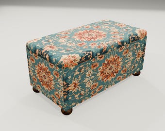 May include: A floral patterned storage ottoman with a teal blue background and orange and white floral accents. The ottoman has four wooden legs.